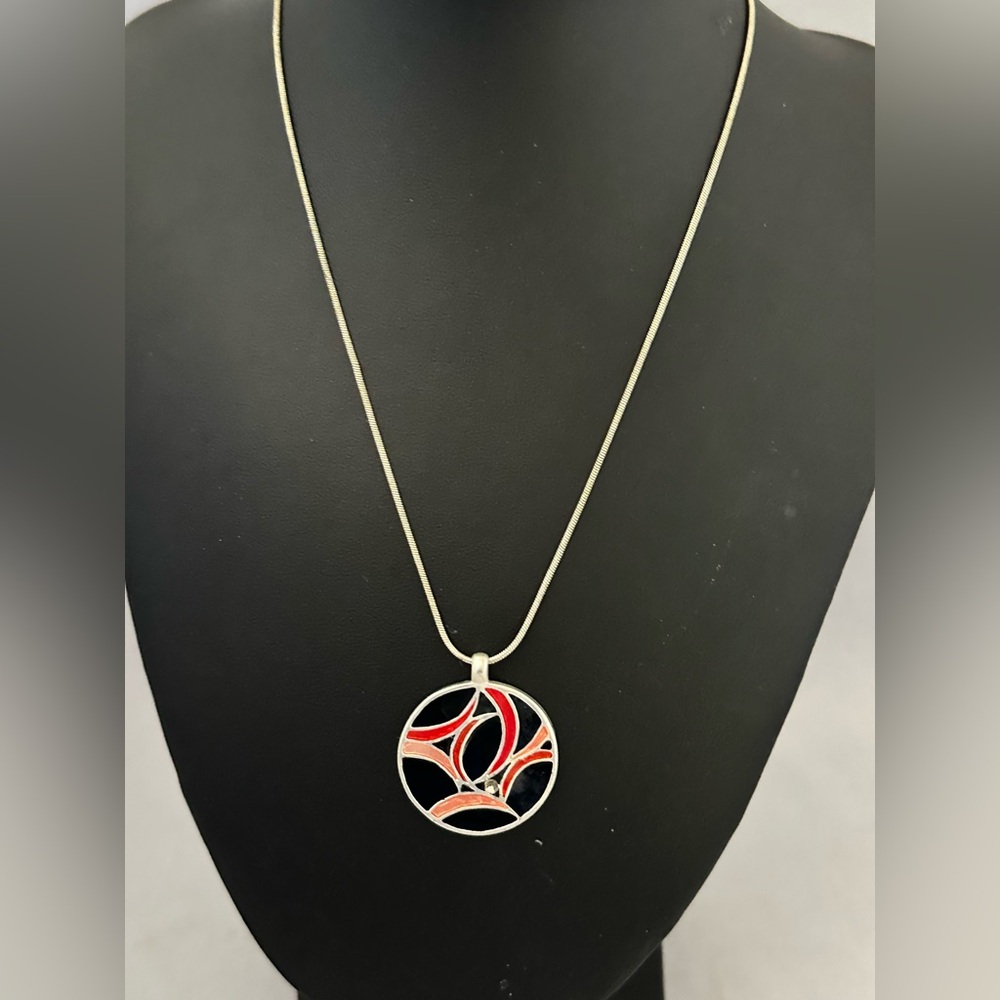 Lavishly Reversible enamel pendant silver tone necklace